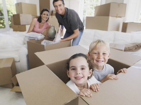 Removal team handling boxes and furniture during a Barking move