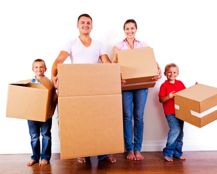 Removal team loading furniture for a Barking home move